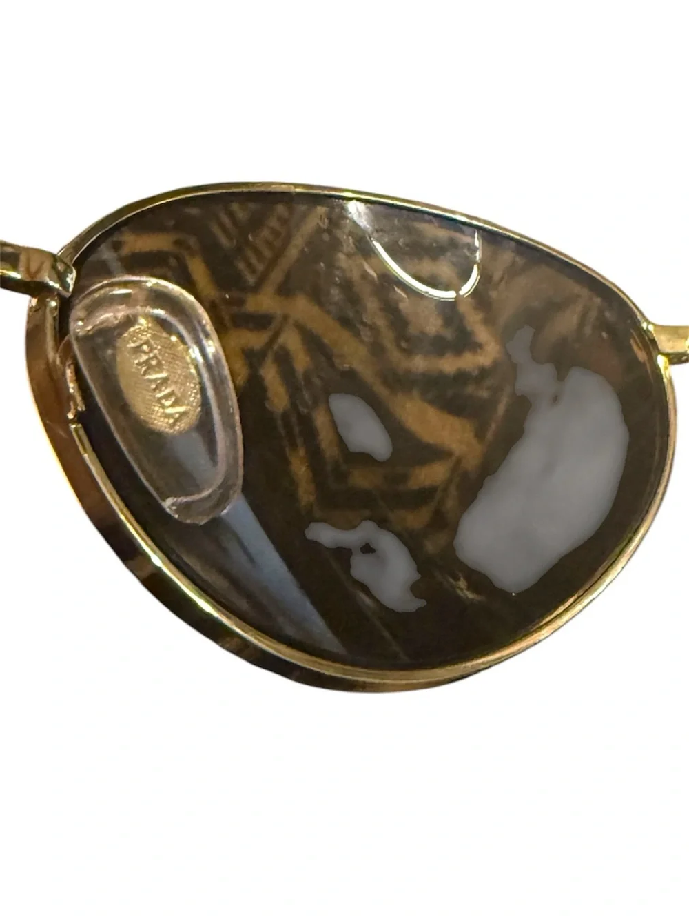Prada PR A59S Women’s Gold Oval Sunglasses
